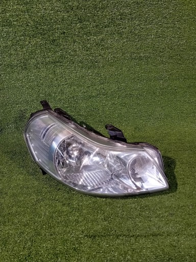 FAR DESNA STRANA FIAT SEDICI SUZUKI SX4 06- ORIGINAL