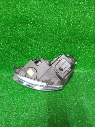 FAR DESNA STRANA VW GOLF V JETTA XENON 1K6941032 NR.R