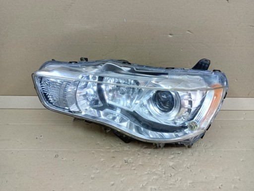 LAMPA FAR LIJEVA STRANA REFLEKOTR MITSUBISHI OUTLANDER II 2 REDIZAJN 10-