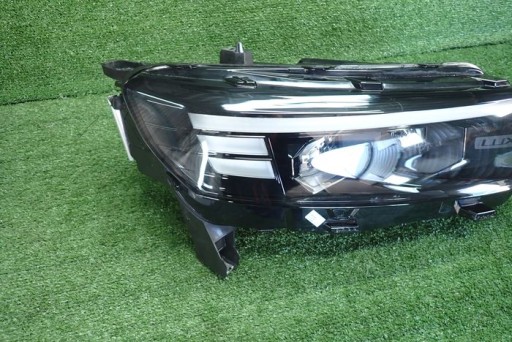 OPEL COMBO INTELLI LUX FAR DESNA STRANA LAMPA