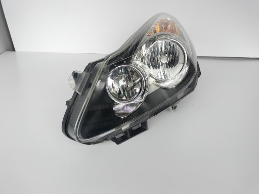 LAMPA FAR LIJEVA STRANA OPEL CORSA D 06-11 TAMNA