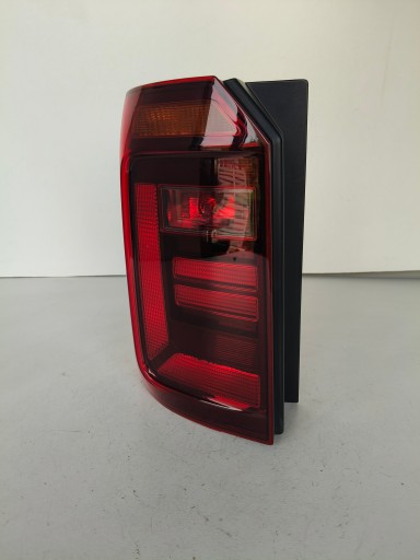 LAMPA FAR LIJEVA STRANA ZADNJA VW CADDY 2K 2K5 15- TAMNA T77