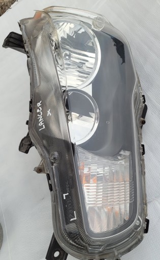 MITSUBISHI LANCER VII EVO X LAMPA FAR LIJEVA STRANA