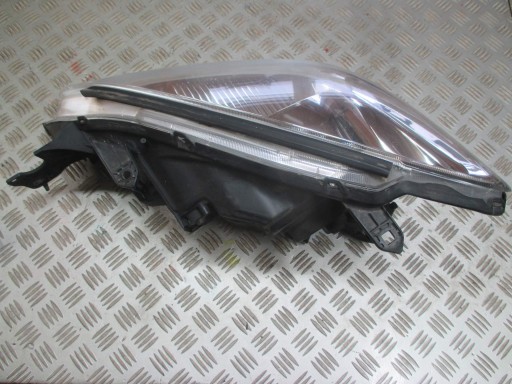 LAMPA FAR DESNA STRANA MITSUBISHI LANCER VII 2003R->
